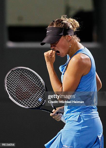 Yanina Wickmayer of Belgium reacts after a point against Marion Bartoli of France during day eight of the 2010 Sony Ericsson Open at Crandon Park...