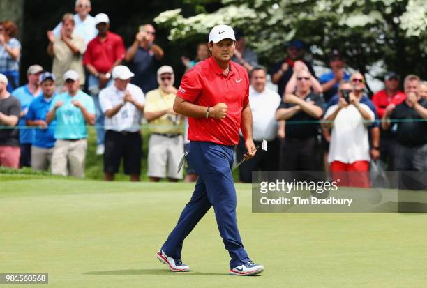 Patrick Reed of the United States reacts after making a putt for eagle on the sixth green during the second round of the Travelers Championship at...