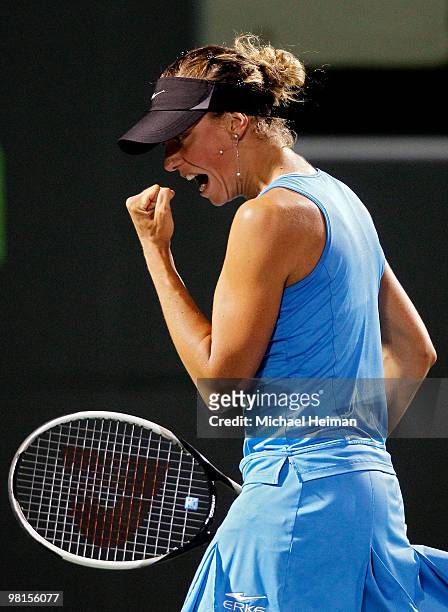 Yanina Wickmayer of Belgium reacts after a point against Marion Bartoli of France during day eight of the 2010 Sony Ericsson Open at Crandon Park...