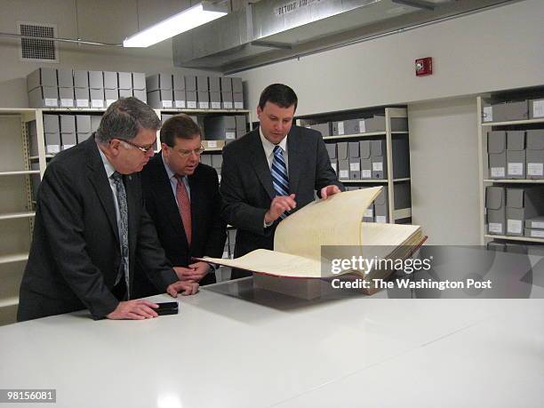 From left, David S. Ferriero, Archivist of the United States, Robert C. Tapella, Public Printer of the United States, and Trevor Plante, chief of...