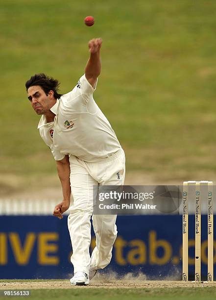 Mitchell Johnson of Australia bowls during day five of the Second Test match between New Zealand and Australia at Seddon Park on March 31, 2010 in...