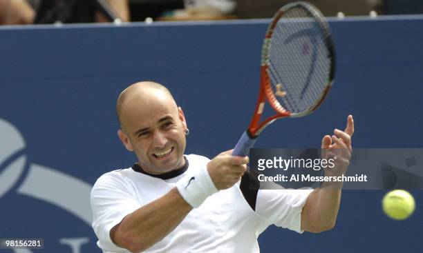 Andre Agassi loses to top-seeded Roger Federer in the quarter finals of the men's singles September 9, 2004 at the 2004 US Open in New York.