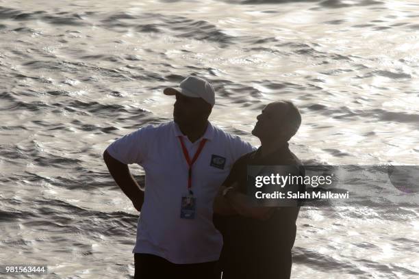 Adnan Nassrat's father looks on as his son returns to land after a successful 48-hour long dive on June 22, 2018 in Aqaba, Jordan. Hassnat seeks to...