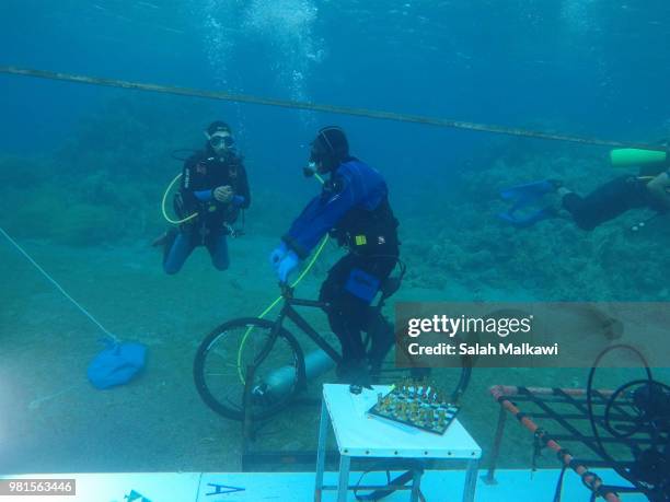 Adnan Nassrat attempts a 48-hour long dive on June 22, 2018 in Aqaba, Jordan. Hassnat seeks to break the Guinness World Record of six days under sea...