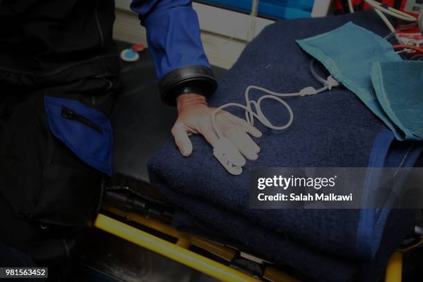Civil defence personnel provide first aid to Adnan Nassrat after his return from a successful 48-hour long dive on June 22, 2018 in Aqaba, Jordan....