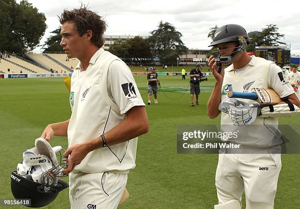 Tim Southee and Chris Martin of New Zealand leave the field following day five of the Second Test match between New Zealand and Australia at Seddon...