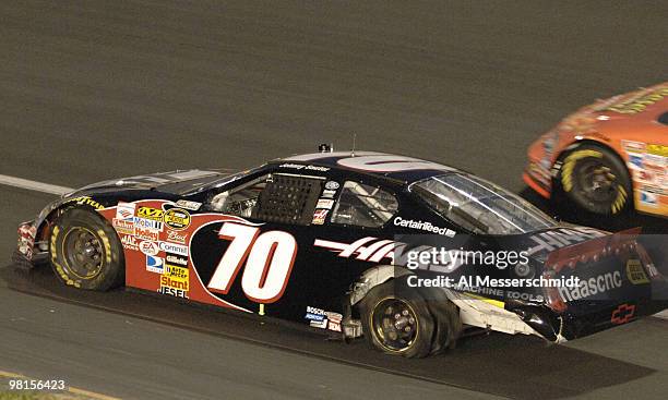 Johnny Sauter heads to the pits after blowing a tire during the NASCAR NEXTEL Cup series Coca-Cola 600 May 28, 2006 at Lowe's Motor Speedway in...