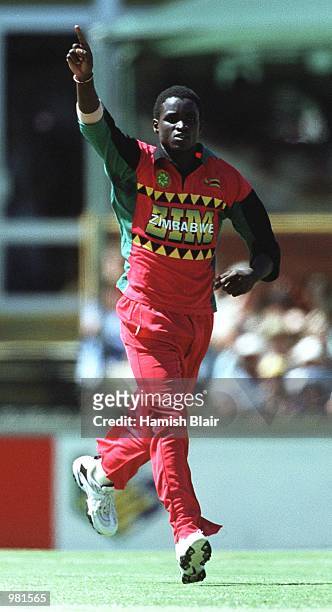 Mluleki Nkala of Zimbabwe celebrates the wicket of Marlon Samuels of the West Indies caught by Alistair Campbell for 10 during the Carlton Series One...