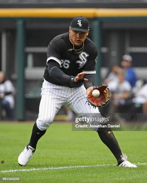 Avisail Garcia of the Chicago White Sox fields a single hit by Jonathan Lucroy of the Oakland Athletics in the 8th inning at Guaranteed Rate Field on...