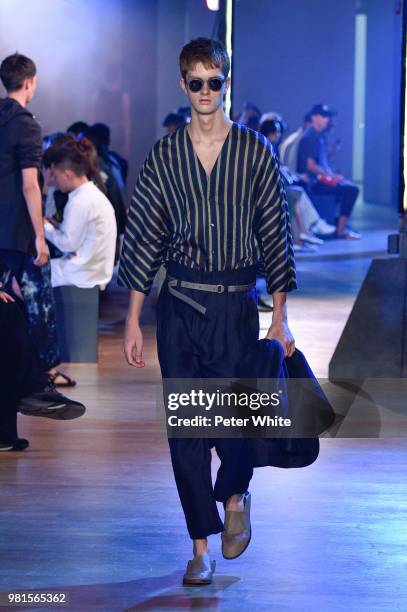 Model walks the runway during the Cerruti 1881 Menswear Spring/Summer 2019 show as part of Paris Fashion Week on June 22, 2018 in Paris, France.