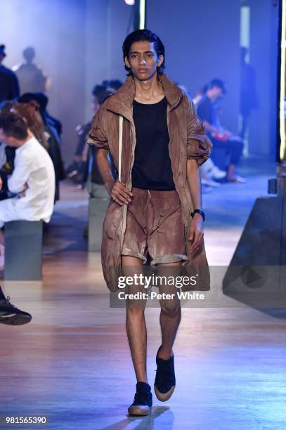 Model walks the runway during the Cerruti 1881 Menswear Spring/Summer 2019 show as part of Paris Fashion Week on June 22, 2018 in Paris, France.