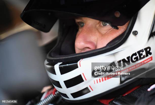 Ryan Newman, driver of the Grainger/American Red Cross Chevrolet, sits in his car during practice for the Monster Energy NASCAR Cup Series...