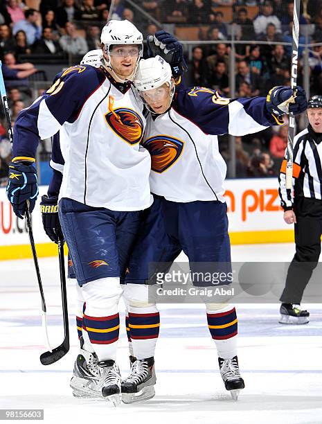 Nik Antropov and Maxim Afinogenov of the Atlanta Thrashers celebrate a third-period goal against the Toronto Maple Leafs March 30, 2010 at the Air...