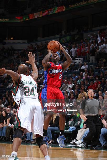 Bobby Brown of the Los Angeles Clippers shoots a jumpshot against Jerry Stackhouse of the Milwaukee Bucks on March 30, 2010 at the Bradley Center in...