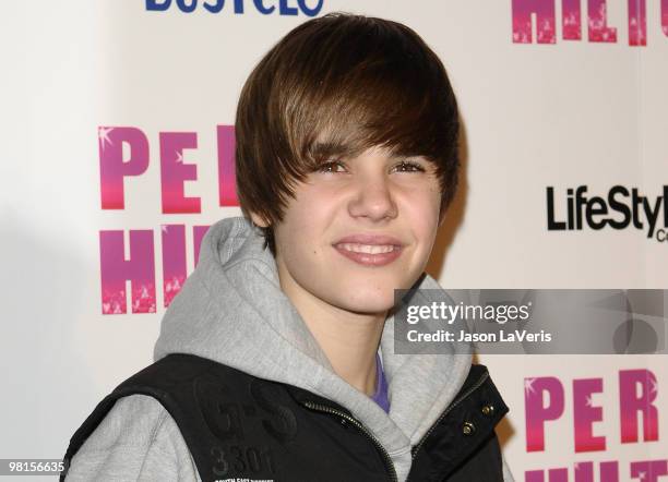 Singer Justin Bieber attends Perez Hilton's "Carn-Evil" Theatrical Freak and Funk 32nd birthday party at Paramount Studios on March 27, 2010 in Los...