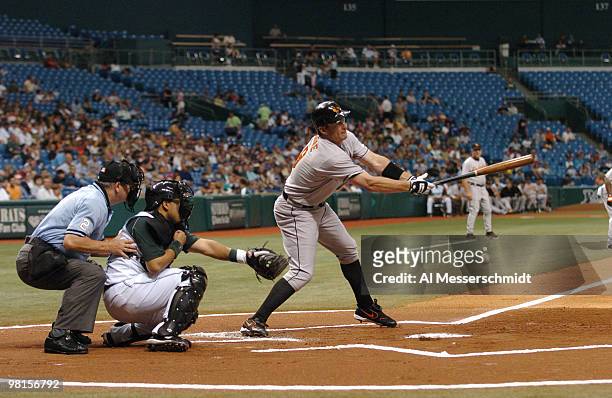 Baltimore Orioles first baseman Jeff Conine attempts a bunt in the first inning against the Tampa Bay Devil Rays July 21, 2006 at Tropicana Field.
