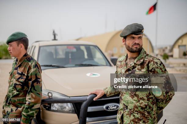 March 2018, Afghanistan, Mazar-i-Sharif: Afghan soldiers of Air Detachment Balkh stand in the Bundeswehr Camp Marmal. Photo: Michael Kappeler/dpa