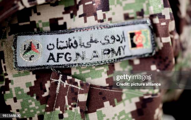 March 2018, Afghanistan, Mazar-i-Sharif: The name of an Afghan soldier of Air Detachment Balkh ist stitched into his uniform. Photo: Michael...