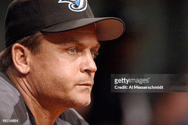 Toronto Blue Jays manager John Gibbons watches play against the Tampa Bay Devil Rays August 15, 2006 in St. Petersburg. The Blue Jays won 4 - 3.