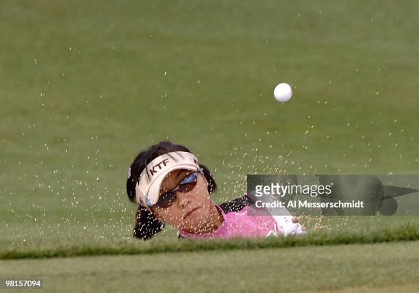 Mi Hyum Kim blasts from a bunker on the fourth hole during the third round of the 2007 Safeway International at Superstition Mountain Golf and...
