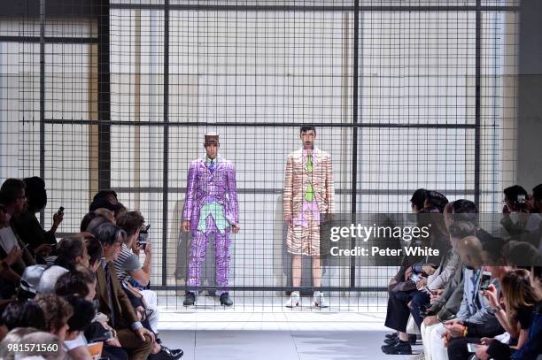 Models walk the runway during the Comme des Garcons Menswear Spring/Summer 2019 show as part of Paris Fashion Week on June 22, 2018 in Paris, France.