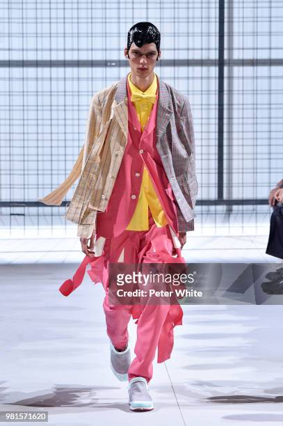 Model walks the runway during the Comme des Garcons Menswear Spring/Summer 2019 show as part of Paris Fashion Week on June 22, 2018 in Paris, France.