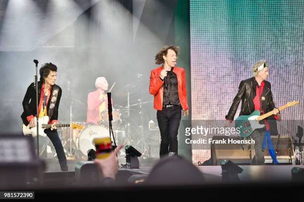 Ron Wood, Charlie Watts, Mick Jagger and Keith Richards of The Rolling Stones perform live on stage during a concert at the Olympiastadion on June...