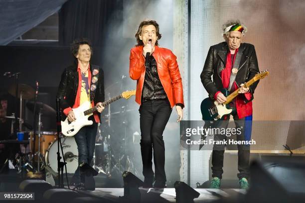 Ron Wood, Mick Jagger and Keith Richards of The Rolling Stones perform live on stage during a concert at the Olympiastadion on June 22, 2018 in...