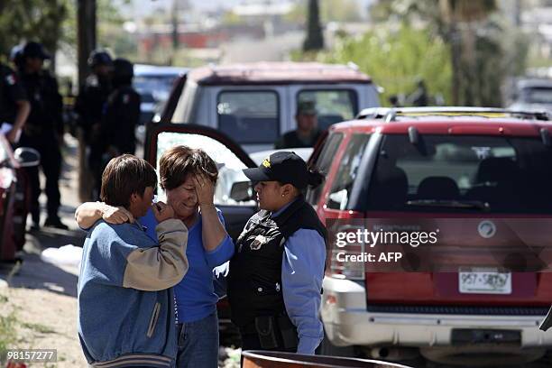 Relative of one of the victims found inside a garage in Ciudad Juarez cries on March 30, 2010. Ciudad Juarez, with 1.3 million inhabitants, is the...