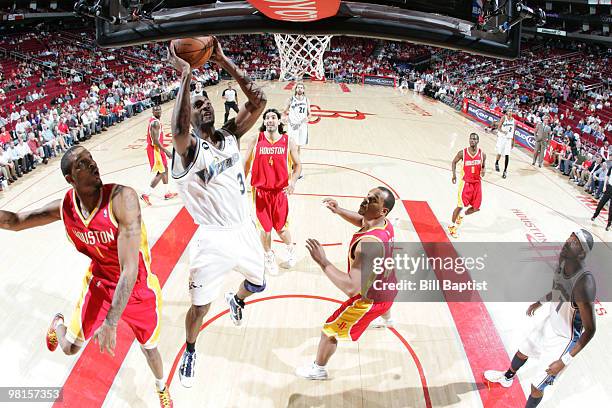 Quinton Ross of the Washington Wizards shoots the ball over Trevor Ariza of the Houston Rockets on March 30, 2010 at the Toyota Center in Houston,...