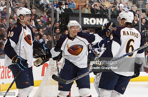 Nik Antropov, Maxim Afinogenov and Ron Hainsey of the Atlanta Thrashers celebrate a third-period goal against the Toronto Maple Leafs March 30, 2010...