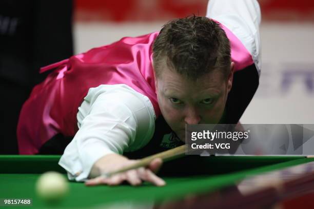 Gerald Green of Northern Ireland plays a shot in his match against Ding Junhui of China during day two of the 2010 Snooker China Open at Beijing...