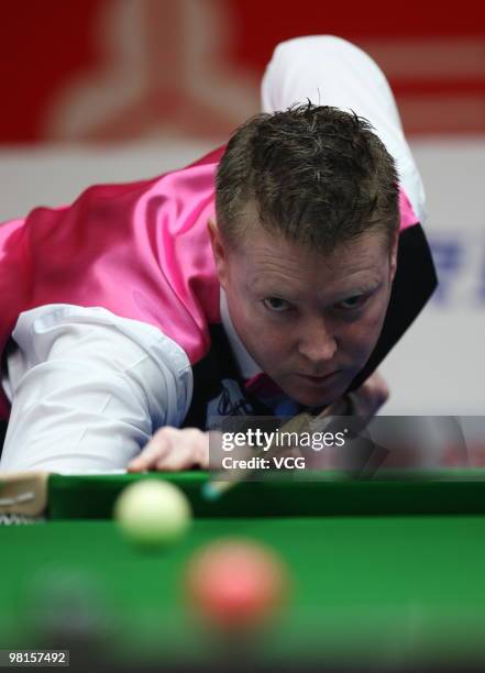 Gerald Green of Northern Ireland plays a shot in his match against Ding Junhui of China during day two of the 2010 Snooker China Open at Beijing...