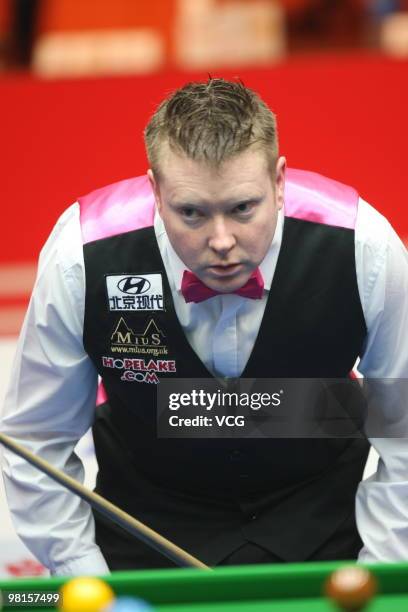 Gerald Green of Northern Ireland plays a shot in his match against Ding Junhui of China during day two of the 2010 Snooker China Open at Beijing...