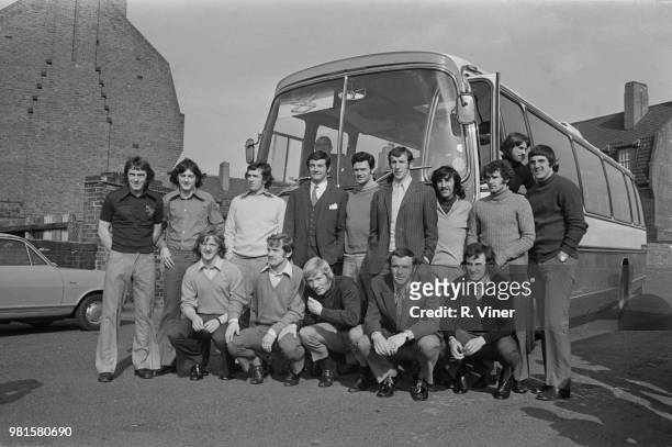 The Birmingham City football team pose together in front of their team coach prior to travelling to an away match in April 1972.