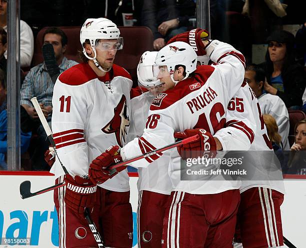 Radim Vrbata of the Phoenix Coyotes celebrates his goal with teammates Martin Hanzal, Petr Prucha and Ed Jovanovski during their game against the...