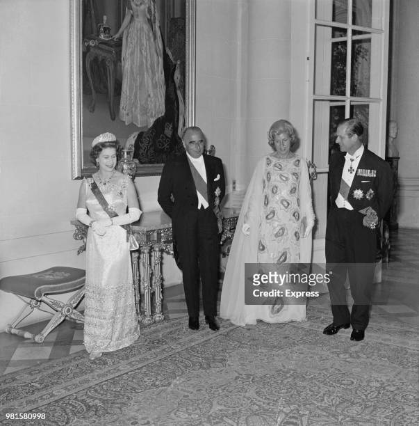 Queen Elizabeth II and Prince Philip, Duke of Edinburgh pictured with President of France Georges Pompidou and his wife Claude Pompidou at the...