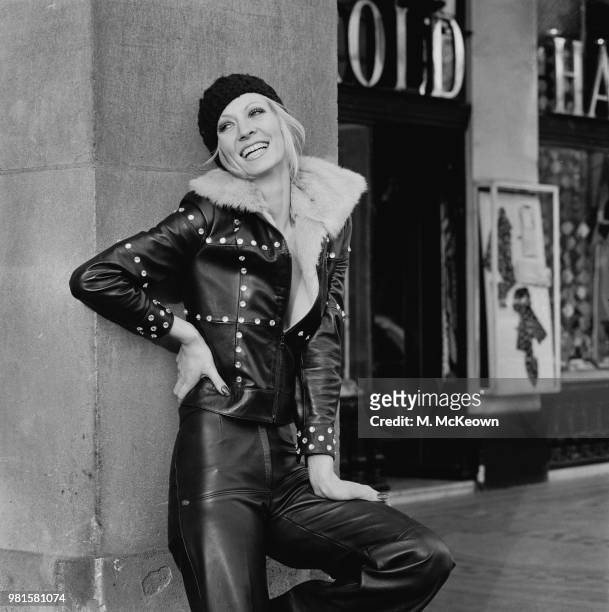 English model and actress Vicki Hodge wears a studded fur lined rocker jacket with matching black leather trousers in London on 11th April 1972.