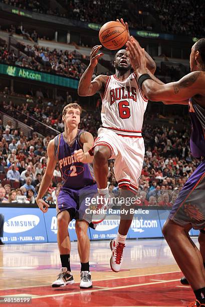 Ronald Murray of the Chicago Bulls takes the ball up to the basket, past Goran Dragic of the Phoenix Suns during a NBA game on March 30, 2010 at the...