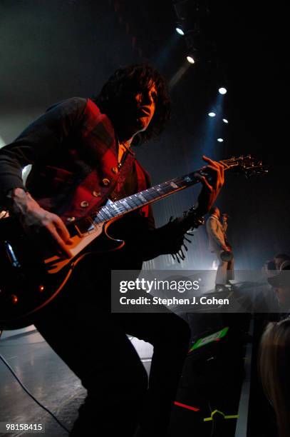 Dean DeLeo and Scott Weiland of Stone Temple Pilots performs at the Louisville Palace on March 30, 2010 in Louisville, Kentucky.