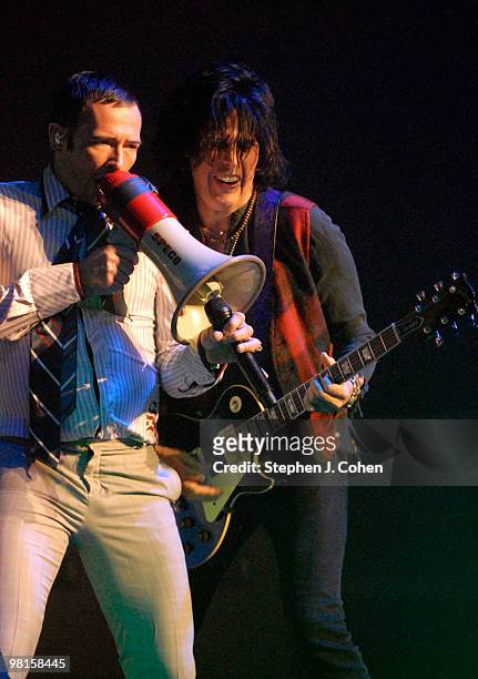 Scott Weiland and Dean DeLeo of Stone Temple Pilots performs at the Louisville Palace on March 30, 2010 in Louisville, Kentucky.