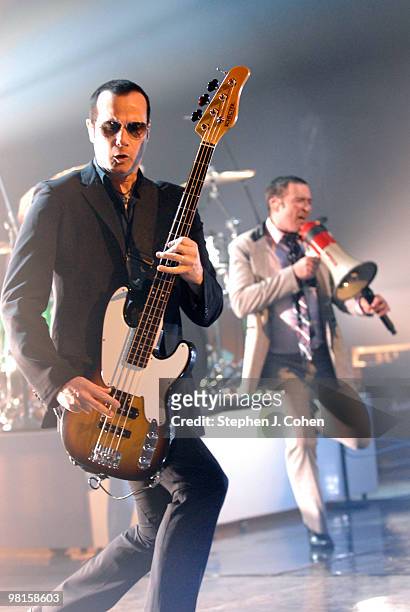 Robert DeLeo and Scott Weiland of Stone Temple Pilots performs at the Louisville Palace on March 30, 2010 in Louisville, Kentucky.