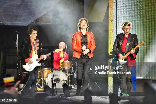 Ronnie Wood, Charlie Watts, Mick Jagger and Keith Richards of The Rolling Stones perform live on stage during a concert at the Olympiastadion on June...