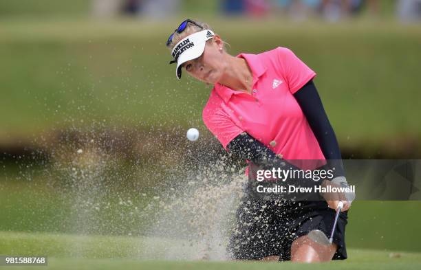 Jessica Korda of the United States plays a shot from a bunker on the third hole during the first round of the Walmart NW Arkansas Championship...