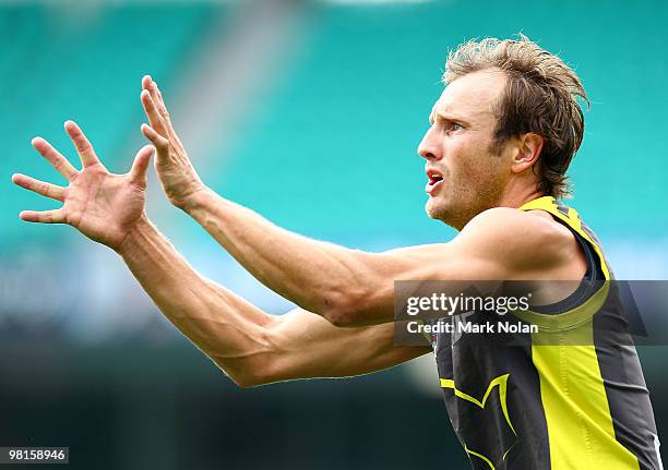 Jude Bolton prepares to take a mark during a Sydney Swans AFL training session at Sydney Cricket Ground on March 31, 2010 in Sydney, Australia.