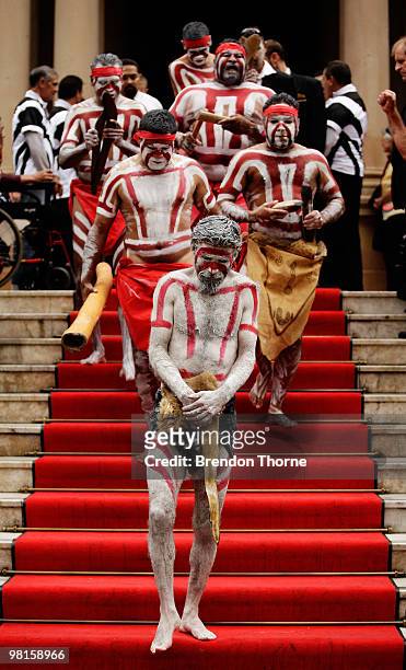 Aboriginal men lead the procession during the state funeral for Australian Aboriginal leader and activist Charles "Chicka" Dixon at Sydney Town Hall...