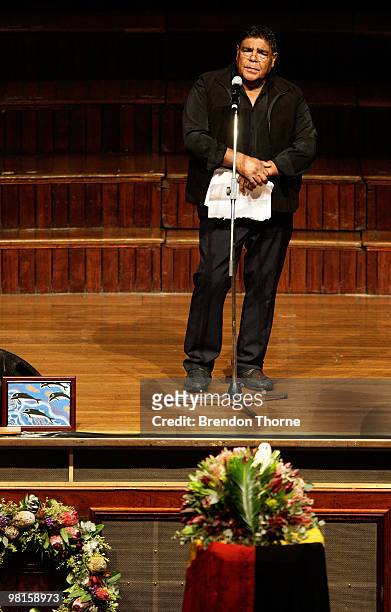 Philip P Bliss sings during the state funeral for Australian Aboriginal leader and activist Charles "Chicka" Dixon at Sydney Town Hall on March 31,...