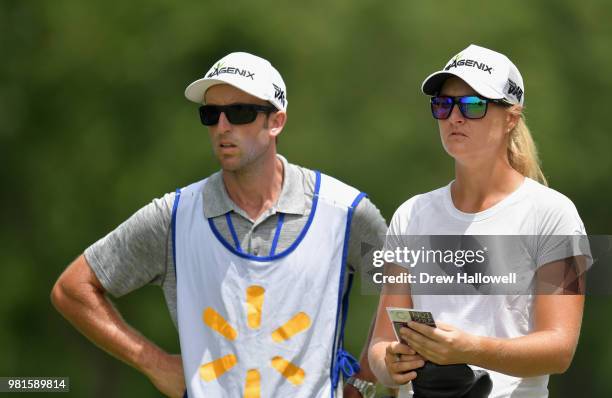 Anna Nordqvist of Sweden and her caddie wait on the third hole during the first round of the Walmart NW Arkansas Championship Presented by P&G at...