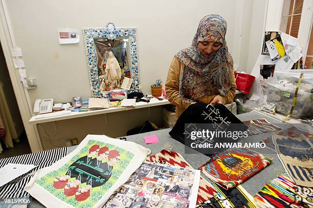 Former inmate works on a handmade handbag for the label Sarah's Bags in Beirut on March 24, 2010. The brainchild and namesake of Lebanese...