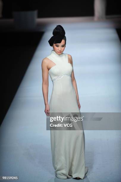 Model walks on the catwalk during the Colombina collection show at the 2010 China Fashion Week A/W on March 29, 2010 in Beijing, China.